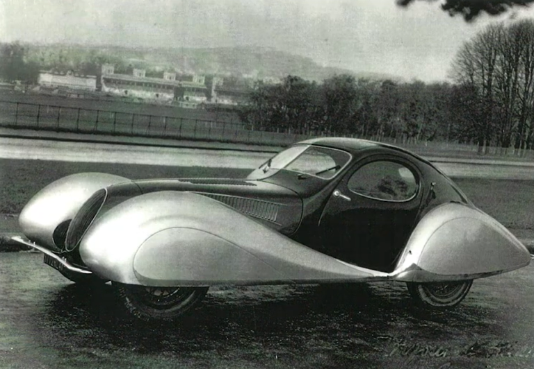 Talbot-Lago T150C SS &lsquo;Teardrop&rsquo; coup&eacute; in profile on an open road